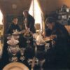 Gustave Caillebotte: Luncheon (1876) Impressionist Masterpiece – Hand-Painted Oil Reproduction by Dafen Village Studio 2 Hand-painted oil painting reproduction of Gustave Caillebotte Luncheon showing figures dining at a sunlit formal table with glassware
