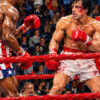 Peinture à l'huile « Rocky Balboa contre Apollo Creed » – Œuvre d'art originale sur toile représentant un combat de boxe, réalisée à l'empâtement épais au couteau à palette 2 Peinture à l'huile « Rocky Balboa contre Apollo Creed » – Œuvre d'art originale sur toile représentant un combat de boxe, réalisée à l'empâtement épais au couteau à palette