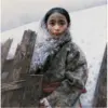 Hand-painted oil reproduction of Ai Xuan's 1997 realism painting Wastelands showing a solitary figure on the vast, snow-covered Tibetan plateau.